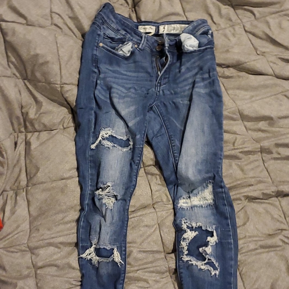 Ripped blue skinny jeans